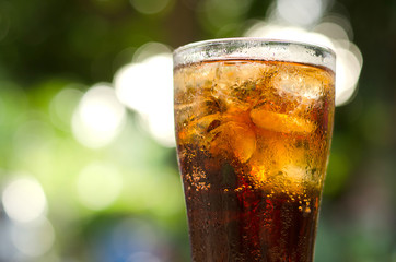 Carbonated water with ice in a glass, drink thirst