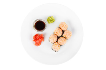 Sushi, rolls, uramaki with sesame, lava sauce, tobiko caviar, raw seafood, soy sauce, marinated ginger and wasabi, food on plate, white isolated background view from above For the menu, restaurant