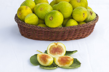 grenn figs open on white background.