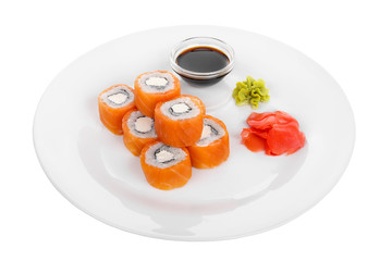 Sushi, rolls, uramaki, philadelphia, with salmon, crab meat, cheese, raw seafood, soy sauce, marinated ginger and wasabi, food on plate, white isolated background Side view For the menu, restaurant