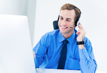 Smiling support phone male operator in headset