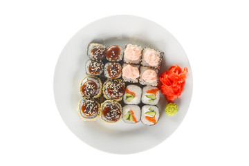 Set of sushi, rolls, uramaki, hosomaki, tempura, with teriyaki, lava sauce, raw seafood, soy sauce, marinated ginger and wasabi, food on plate, white isolated background view from above For the menu