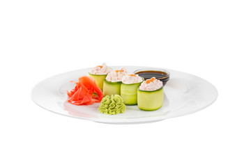 Sushi, rolls, gunkan-poppies, crab meat, shrimp, avocado, cucumber, raw seafood, soy sauce, marinated ginger and wasabi, food on plate, white isolated background Side view For the menu, restaurant