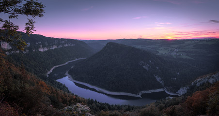 Sundown behind beautiful idyllic hills. Magical sunset.
