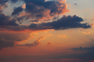 Brilliant orange sunset over the clouds