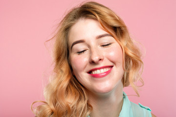 emotion expression. very happy joyful thrilled to bits woman with beaming smile. young beautiful...