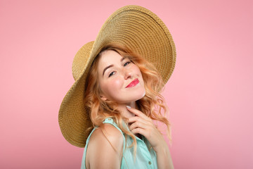 emotion expression very happy joyful thrilled to bits woman with beaming smile and big sunhat....