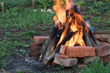 Bonfire burning. Brightly, heat, light, camping, big bonfire