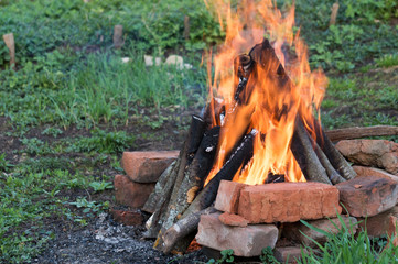 Bonfire burning. Brightly, heat, light, camping, big bonfire