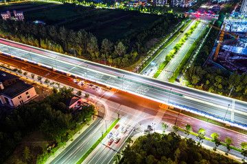 busy trffic road with city skyline in hangzhou china