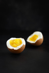 boiled egg on a black background