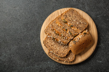 Rye grain bread on wooden cutting board
