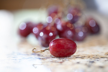 Red Grapes On Granite Counter Top
