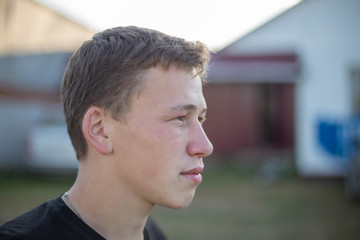 youth in a black T-shirt