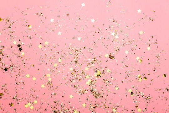 Pink festive confetti background. Bright background for celebration birthday.