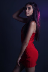 Sexy young beauty woman in red dress