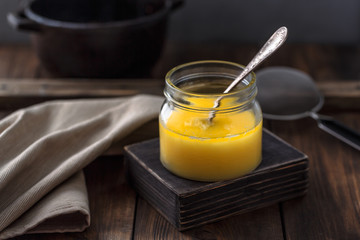 Ghee or clarified butter in a jar.