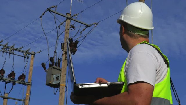 Electrician with portable computer