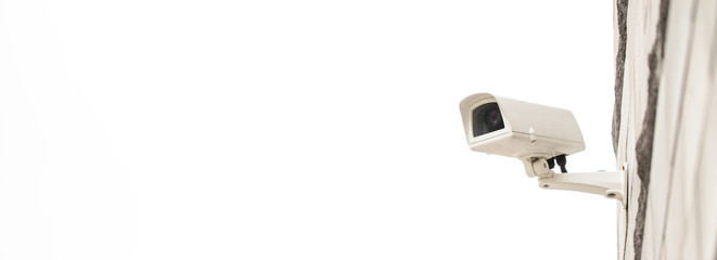 Surveillance camera on wall