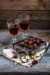 Roasted chestnuts in an old box. Selective focus.