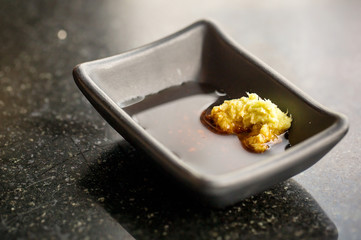 Close up wasabi cream and soy sauce. sauce for japanese food, sushi, sashimi and teppanyaki.
