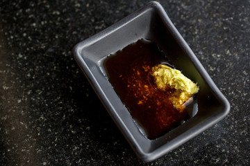 Close up wasabi cream and soy sauce. sauce for japanese food, sushi, sashimi and teppanyaki.