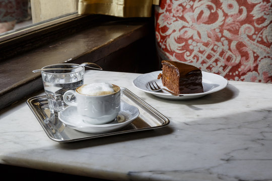 Wiener melange and on cafe table