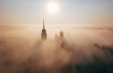 An incredibly beautiful misty morning over Vladimir. Aerial view on Assumption Cathedral in the fog. Russia. Vladimir