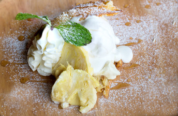 oriental dessert, durian waffle and cream. special summer thai dessert. king of asian fruits. sweet, fat and high calories. image for background, wallpaper, copy space and backdrop.