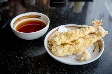 shrimp fried, tempura and sweet sauce for dipping. japanese culture food. image for background, wallpaper ,copy space and menu list.