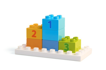 Right side view of winners pedestal built from colorful blocks.