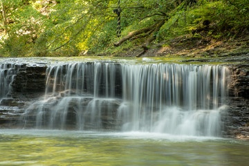 Fototapeta na wymiar Waterfall on Four Mile creek late summer Wintergreen Gorge