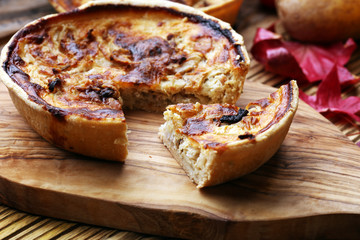 Homemade Cheesy Egg Quiche for Brunch with Spinach and Tomato, onions and zucchini.