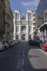 Fototapeta premium View from the street of the historic Notre-Dame de Nice Roman Catholic basilica