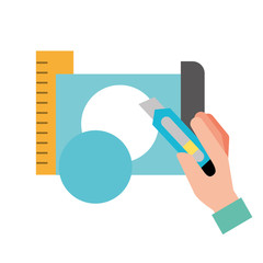 hand holding cutter making circle with paper