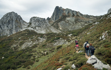 Fototapeta na wymiar hikers walking towards Pico Torres in Asturias, Spain
