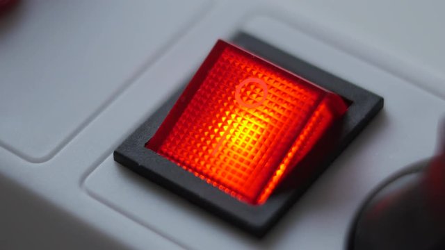 Male Finger Turn On Switch Of Electricity Extension Cord