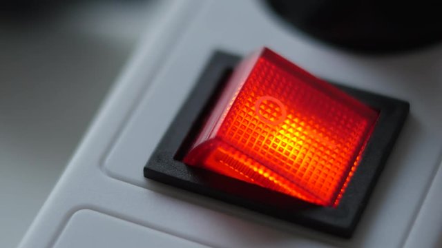 Male Finger Turn On Switch Of Electricity Extension Cord