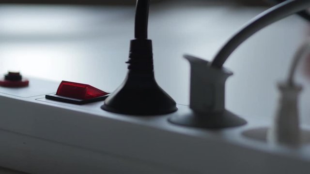 Male Finger Turn Off Switch Of Electricity Extension Cord