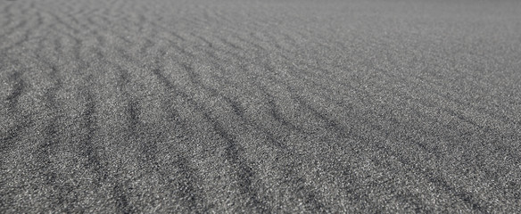 Black sand waves as background