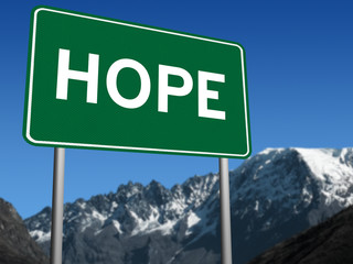 Hope sign on blue sky background with mountains
