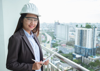 Portrait asia woman engineer working at construction site