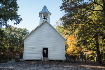 old wooden church in autumn smoky mountains
