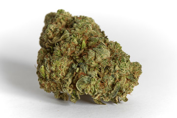 Close up macro photo of recreational and medical prescription hybrid strain  wedding cake flower on white background