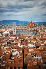 Fototapeta premium Duomo Santa Maria Del Fiore from Tower of Arnolfo at Palazzo Vecchio rooftop