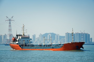 Boat and Xiamen city skyline