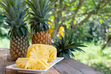 Pineapple on the wood  background