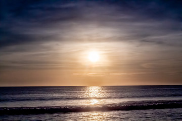 Naklejka na ściany i meble Blue Shaded Sunset at Karon Beach Over the Ocean