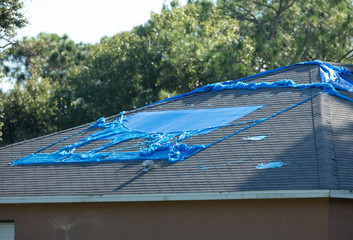high winds and hurricane damage has caused leaks in your roof © J.A.