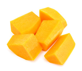 A group of cut and slice butternut squash chunks on a white background.